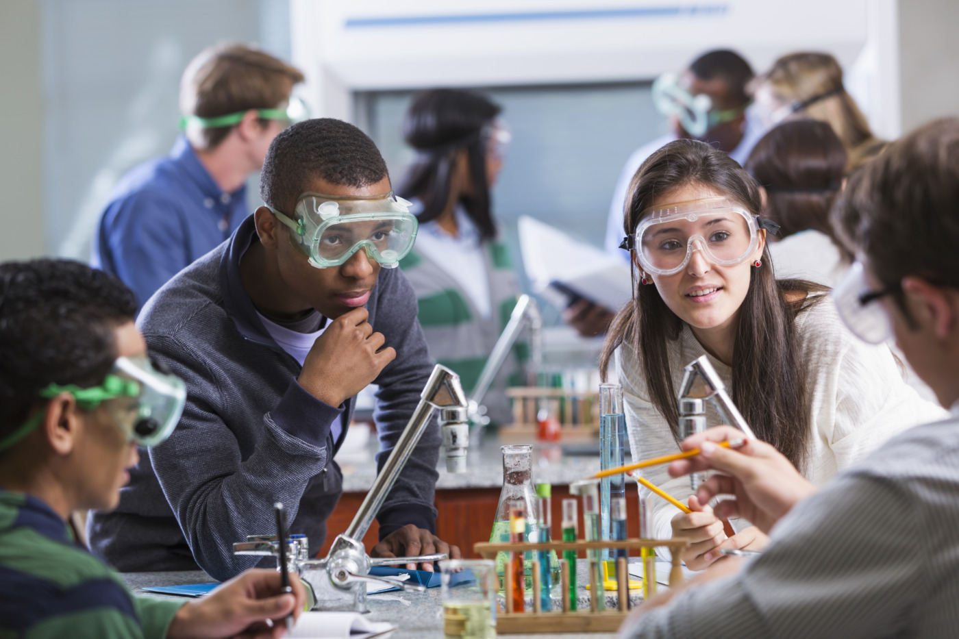 group-of-multi-ethnic-students-in-chemistry-lab-3