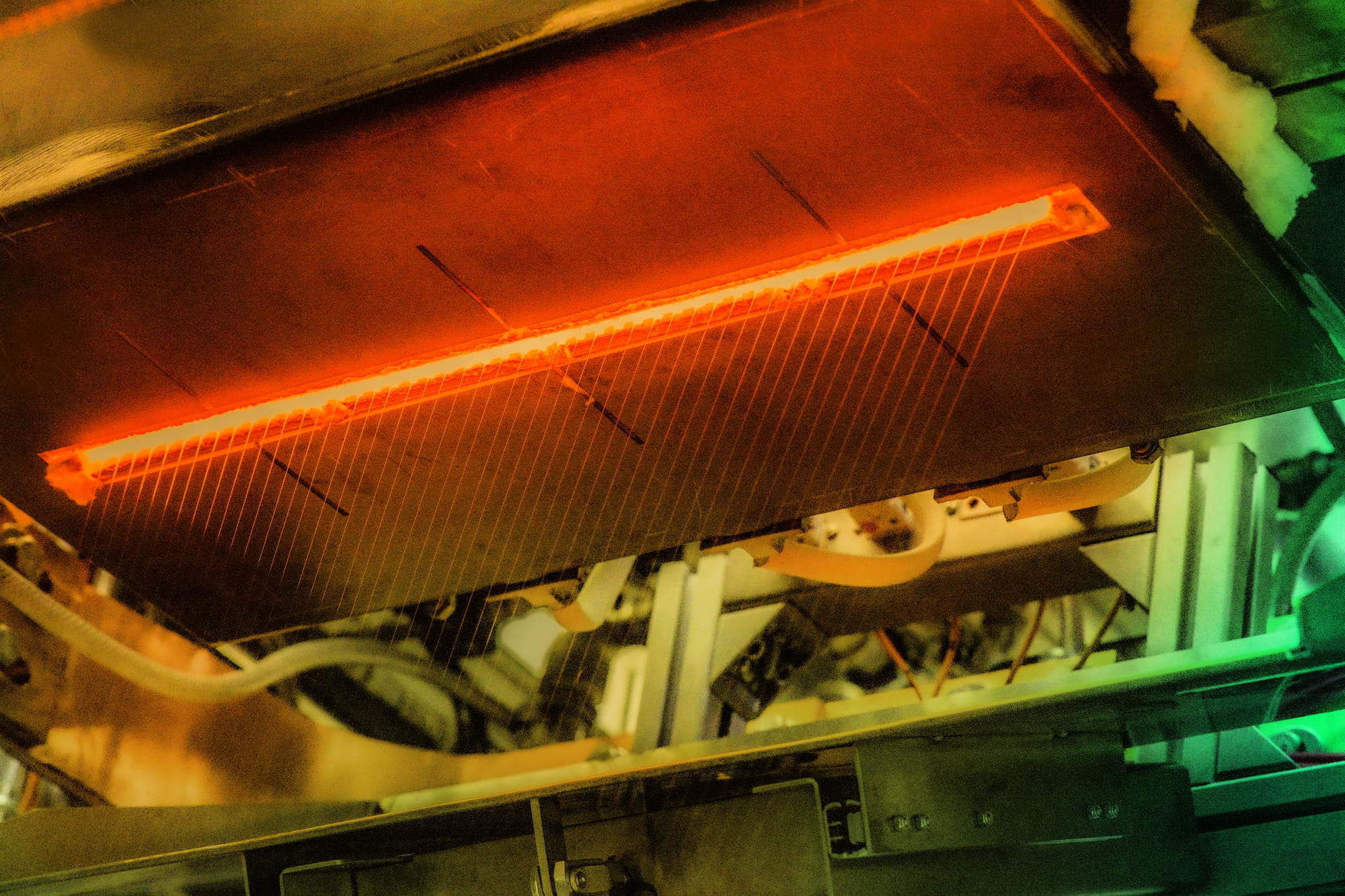 The bushing nozzle used to draw fibres during FibreCoat’s production process. Photo: Fibrecoat